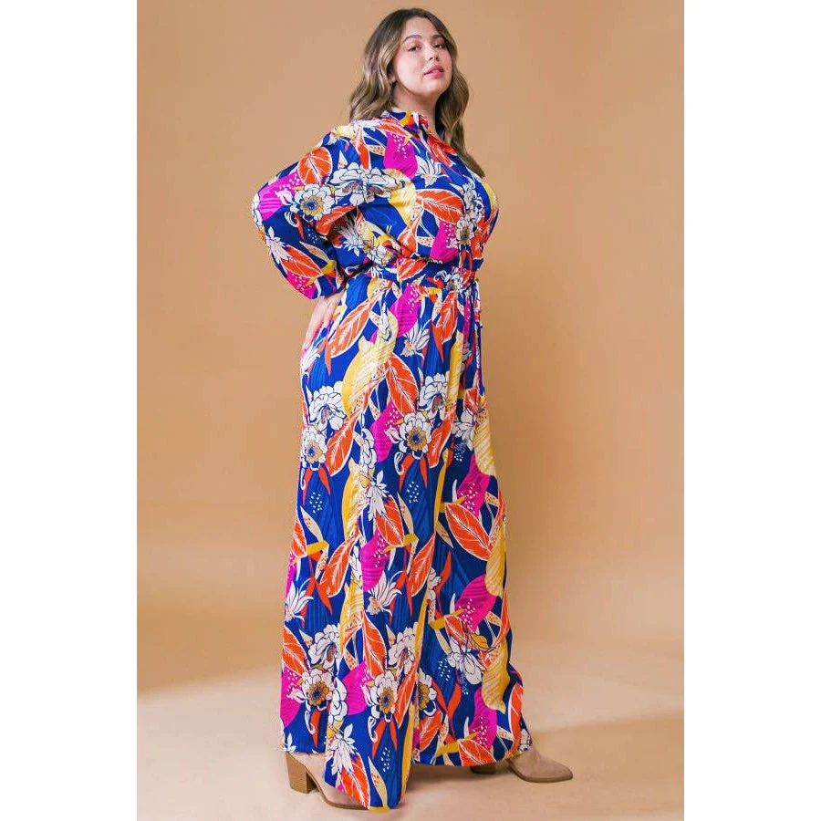 Plus Size Printed Woven Jumpsuit in Blue with Flowers And Leaf Designs | Long Sleeve Romper [Sizes 1X-3X] - Image 2