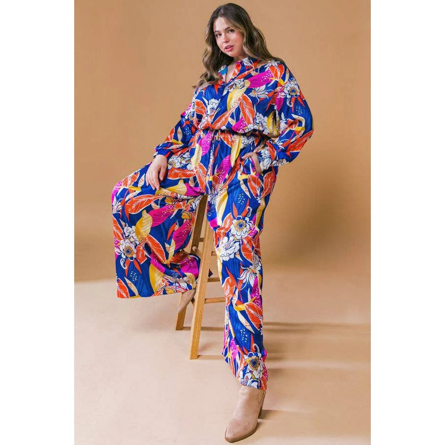 Plus Size Printed Woven Jumpsuit in Blue with Flowers And Leaf Designs | Long Sleeve Romper [Sizes 1X-3X] - Image 5