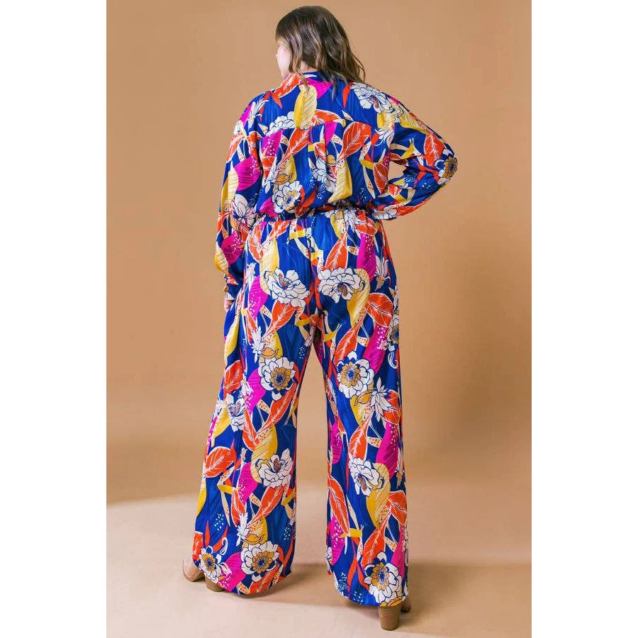 Plus Size Printed Woven Jumpsuit in Blue with Flowers And Leaf Designs | Long Sleeve Romper [Sizes 1X-3X] - Image 7