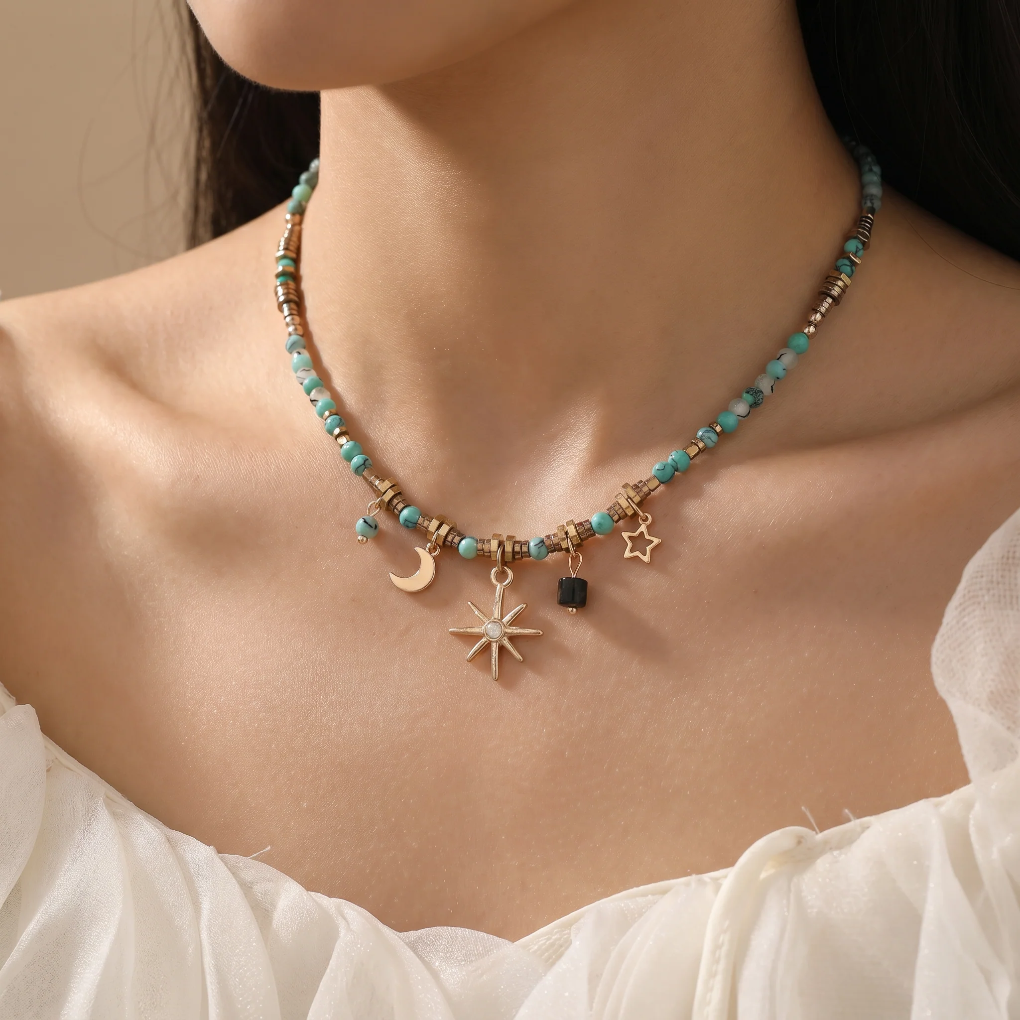 Beaded Celestial Necklace | Sun, Star & Moon Charms in Aqua, Gold & Bronze - Image 6