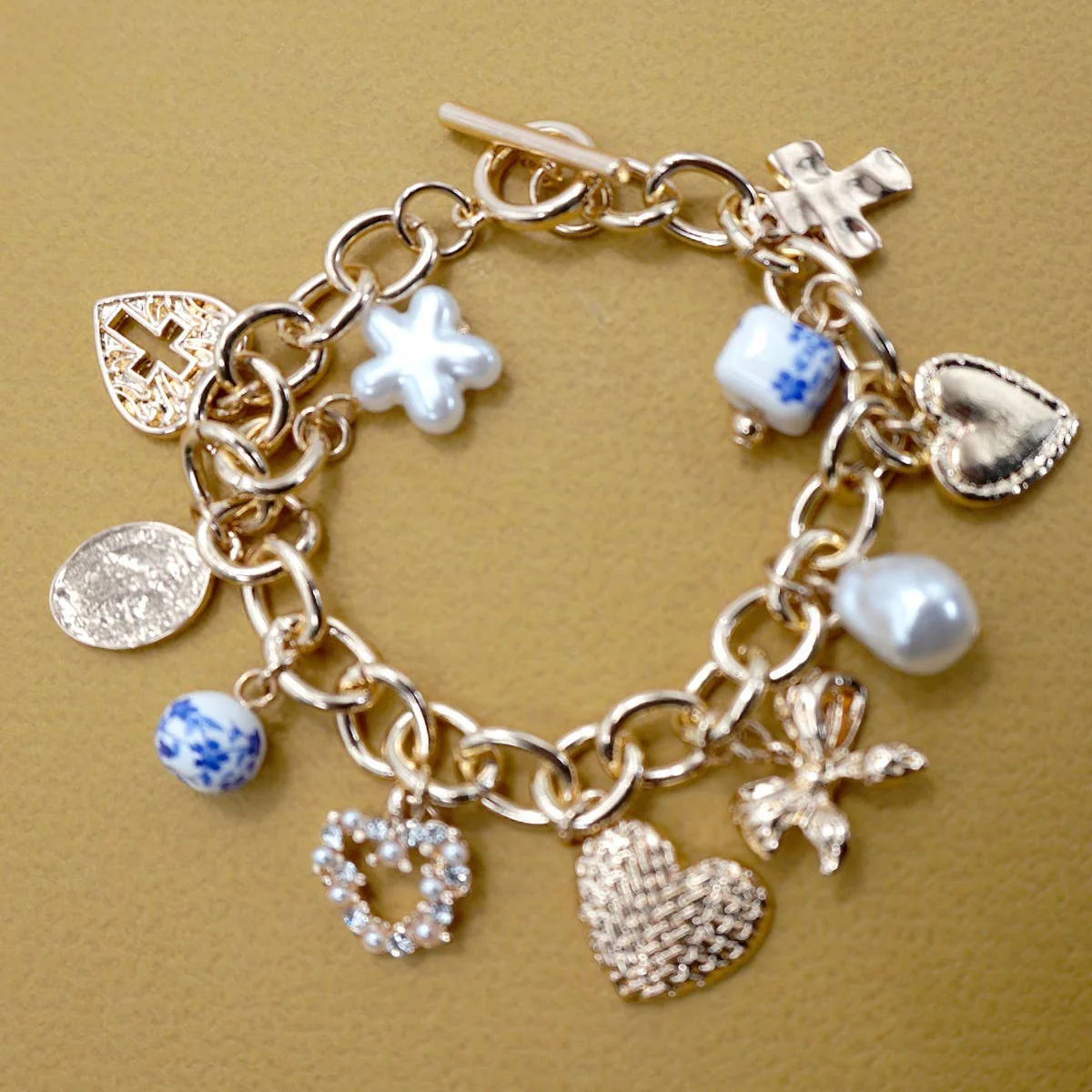 Heart Coquette Bow Cross Multi Charm with Blue Ceramic Porcelain Toggle Bracelet | In Gold Plating 7.5" Long