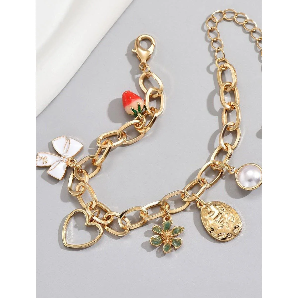 White Coquette Bow Strawberry Pearl Multi Charm Bracelet in Gold Plating | 7" Long - Image 2