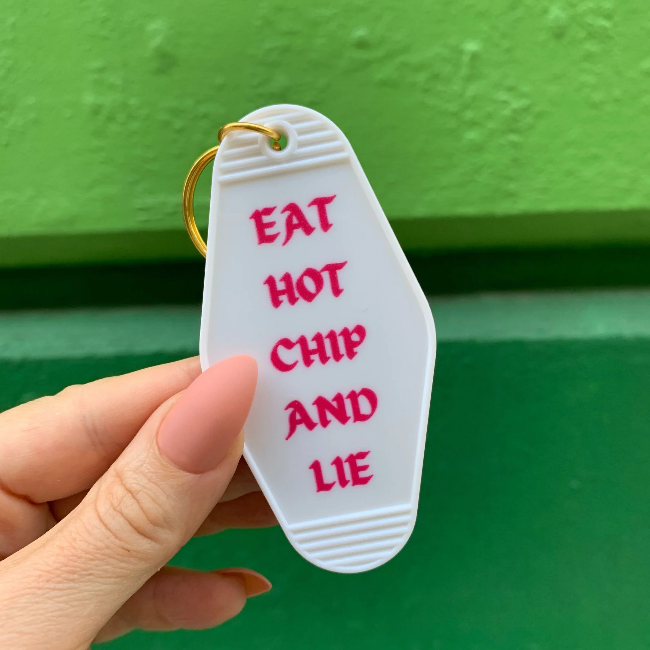 Eat Hot Chip and Lie Motel Style Keychain in White - Image 4