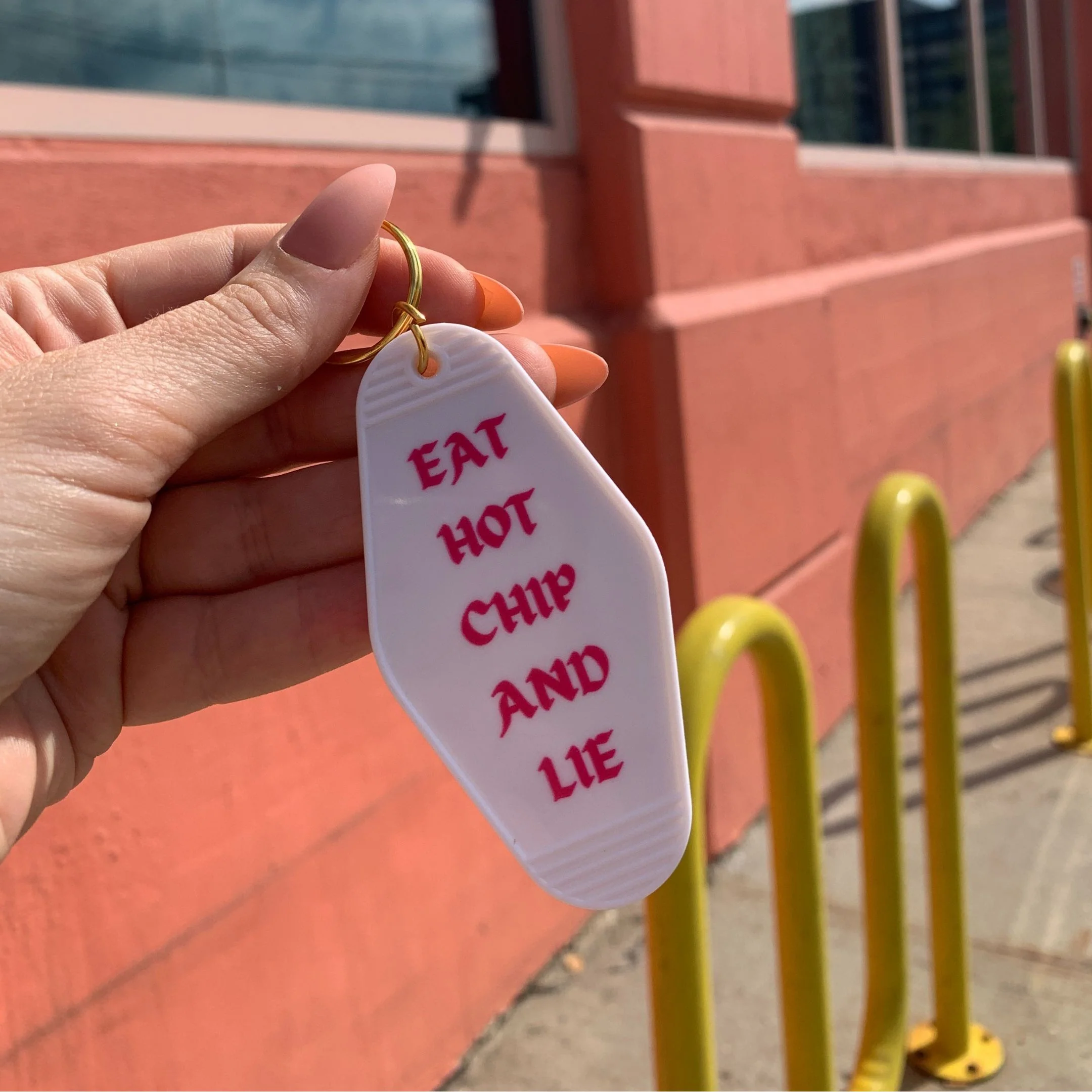 Eat Hot Chip and Lie Motel Style Keychain in White - Image 9