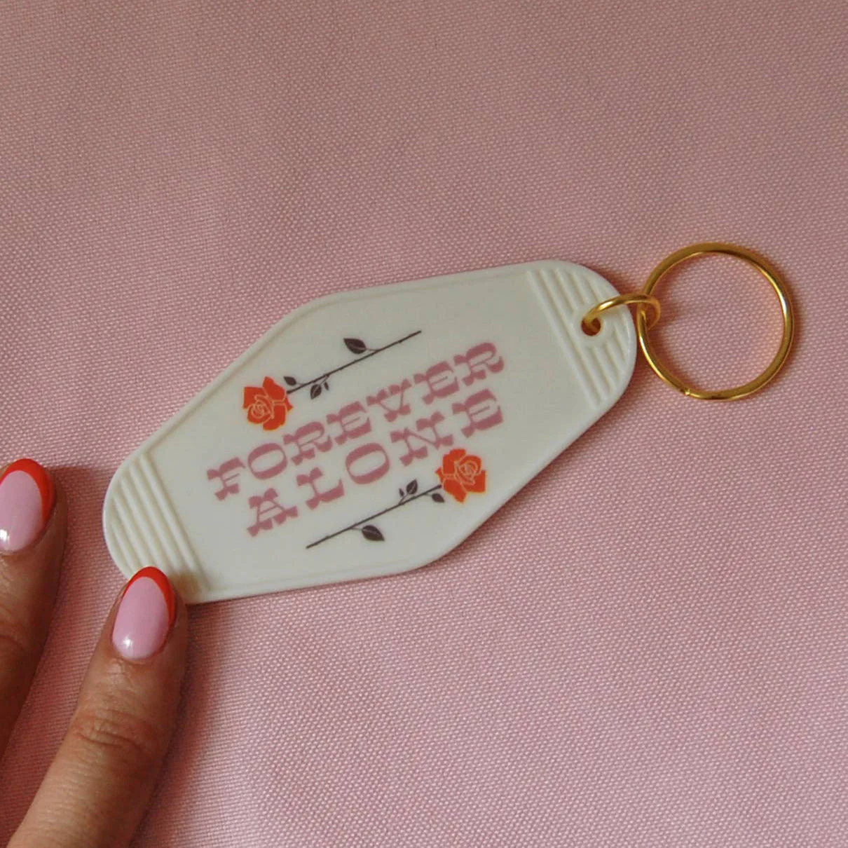 Forever Alone Motel Style Keychain in Pink - Image 3