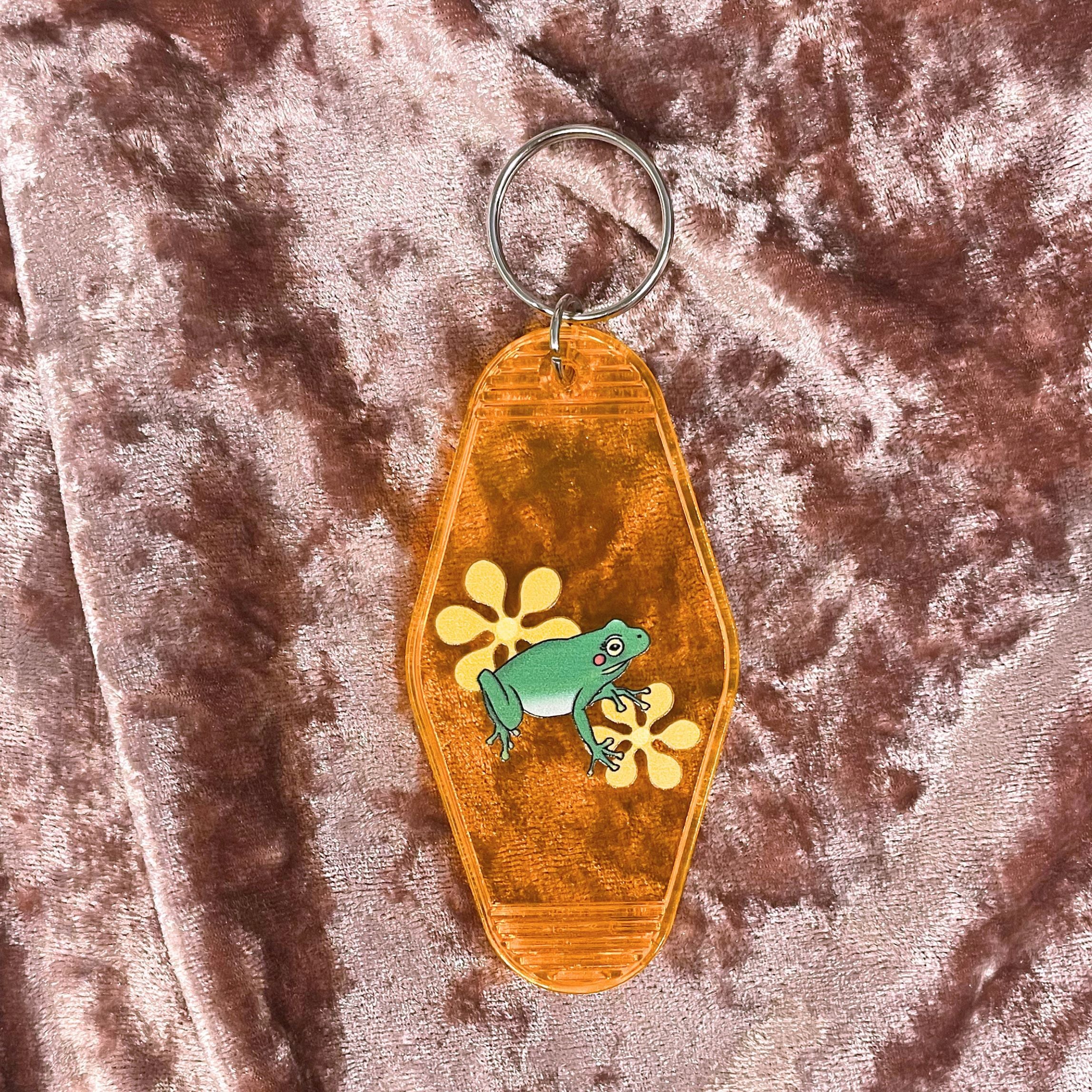 Frog Friend Motel Keychain in Transparent Orange - Image 2
