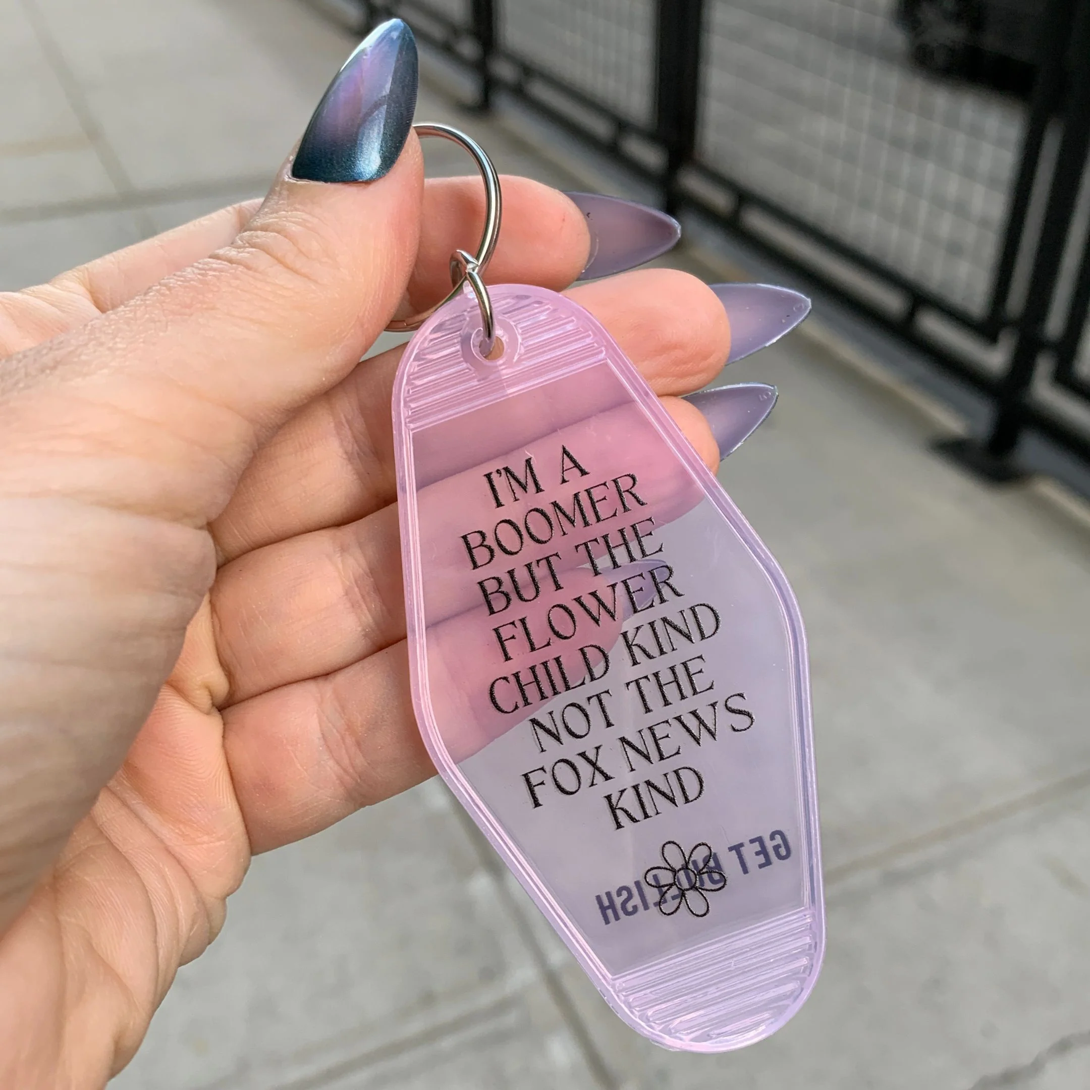 I’m a Boomer But Not the Fox News Kind Motel Style Keychain in Translucent Pink - Image 5