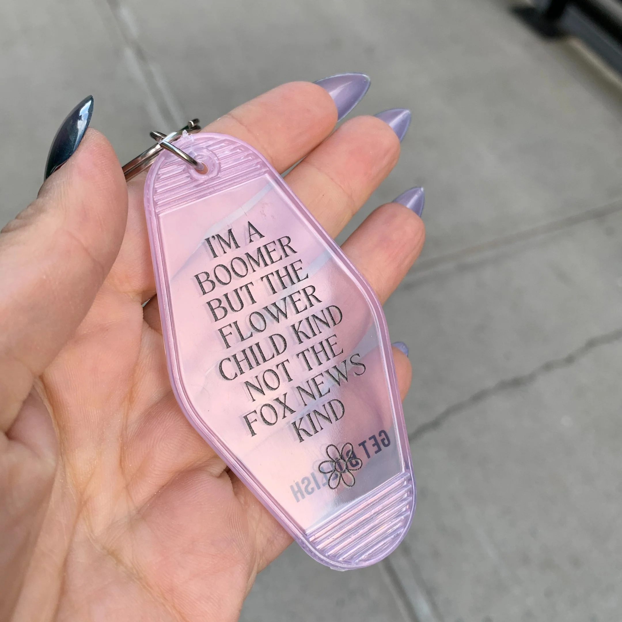 I’m a Boomer But Not the Fox News Kind Motel Style Keychain in Translucent Pink - Image 6