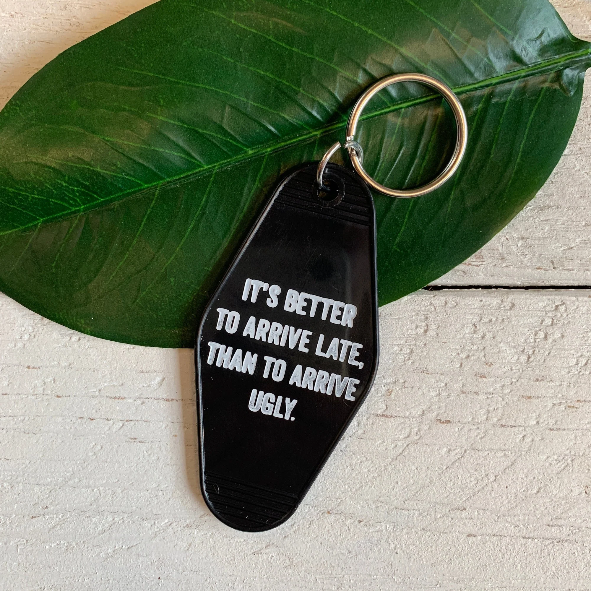 It's Better To Arrive Late, Than To Arrive Ugly Keychain in Black and White - Image 10