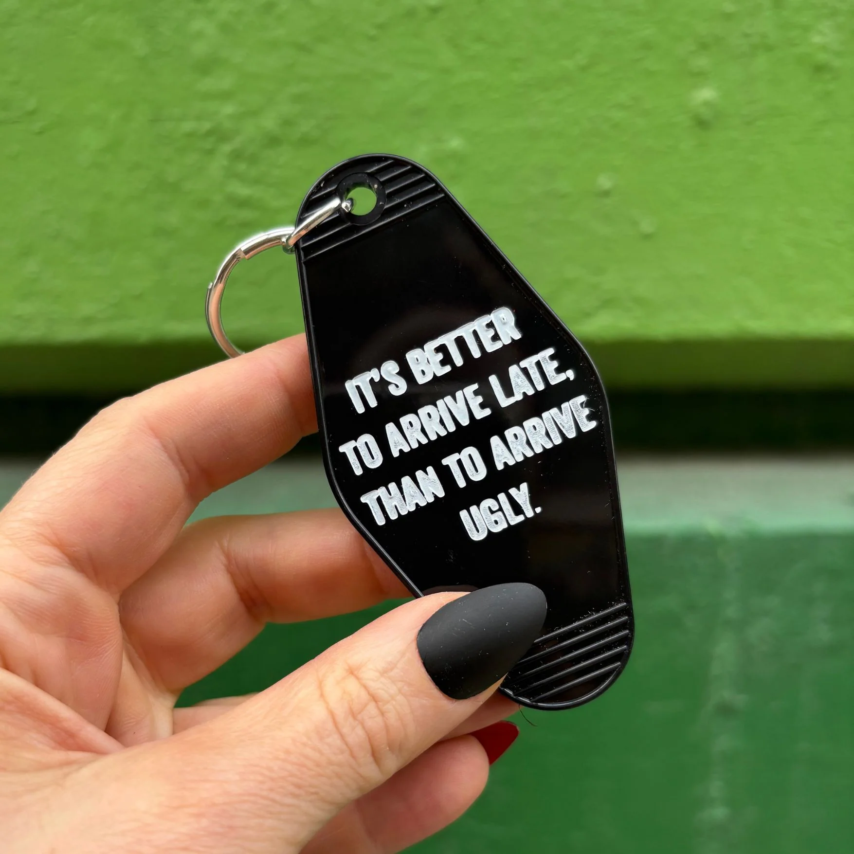 It's Better To Arrive Late, Than To Arrive Ugly Keychain in Black and White - Image 4