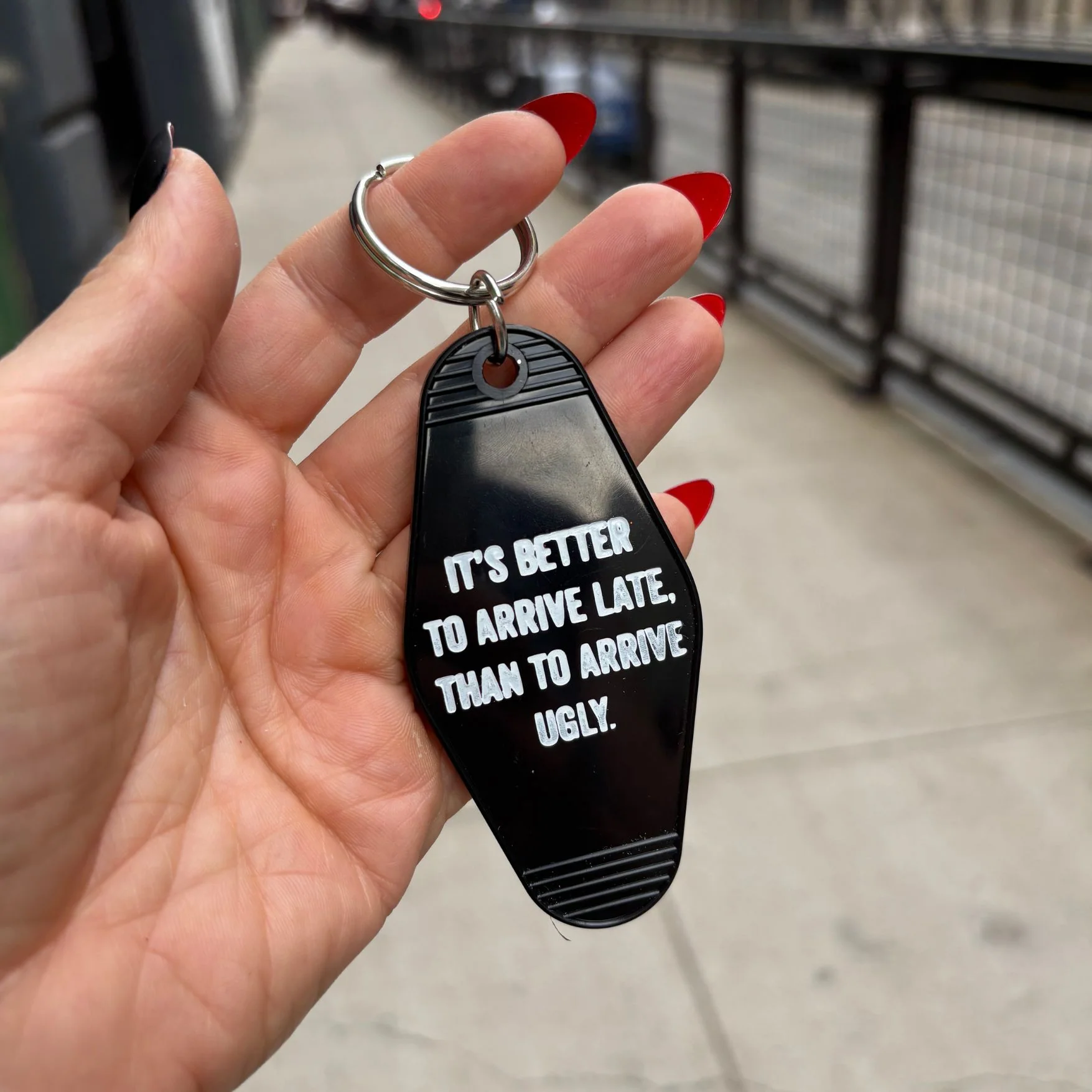 It's Better To Arrive Late, Than To Arrive Ugly Keychain in Black and White - Image 6