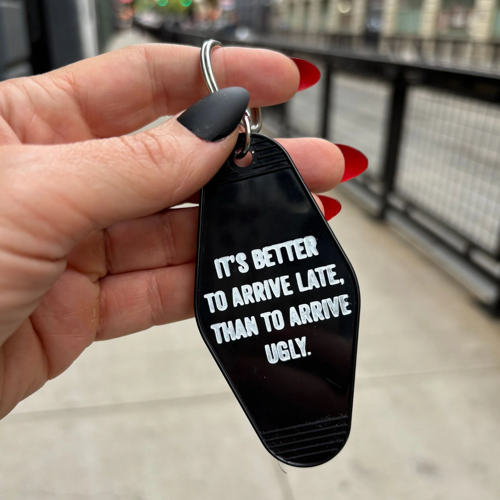 It's Better To Arrive Late, Than To Arrive Ugly Keychain in Black and White - Image 8
