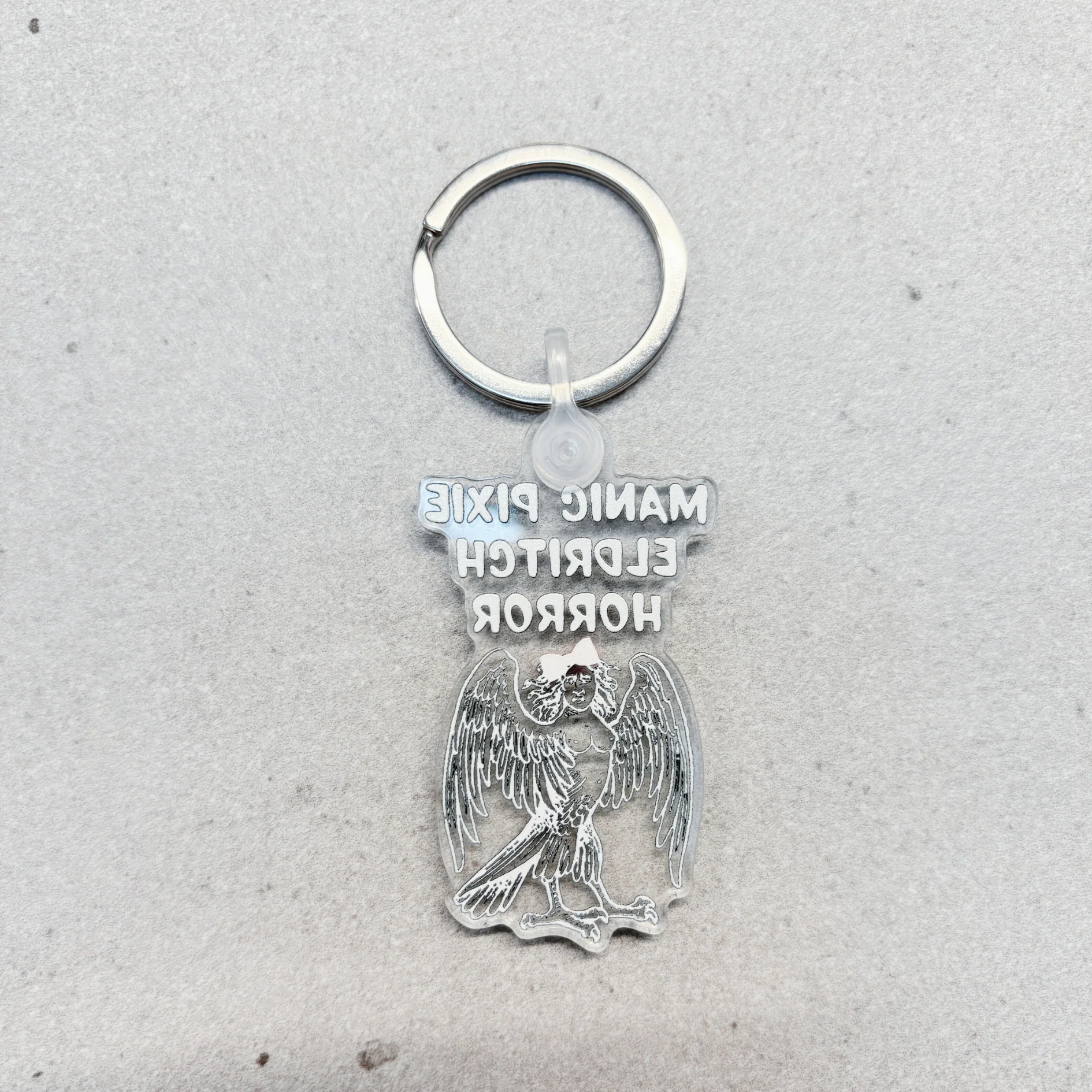 Manic Pixie Eldritch Horror Acrylic Keychain - Image 4