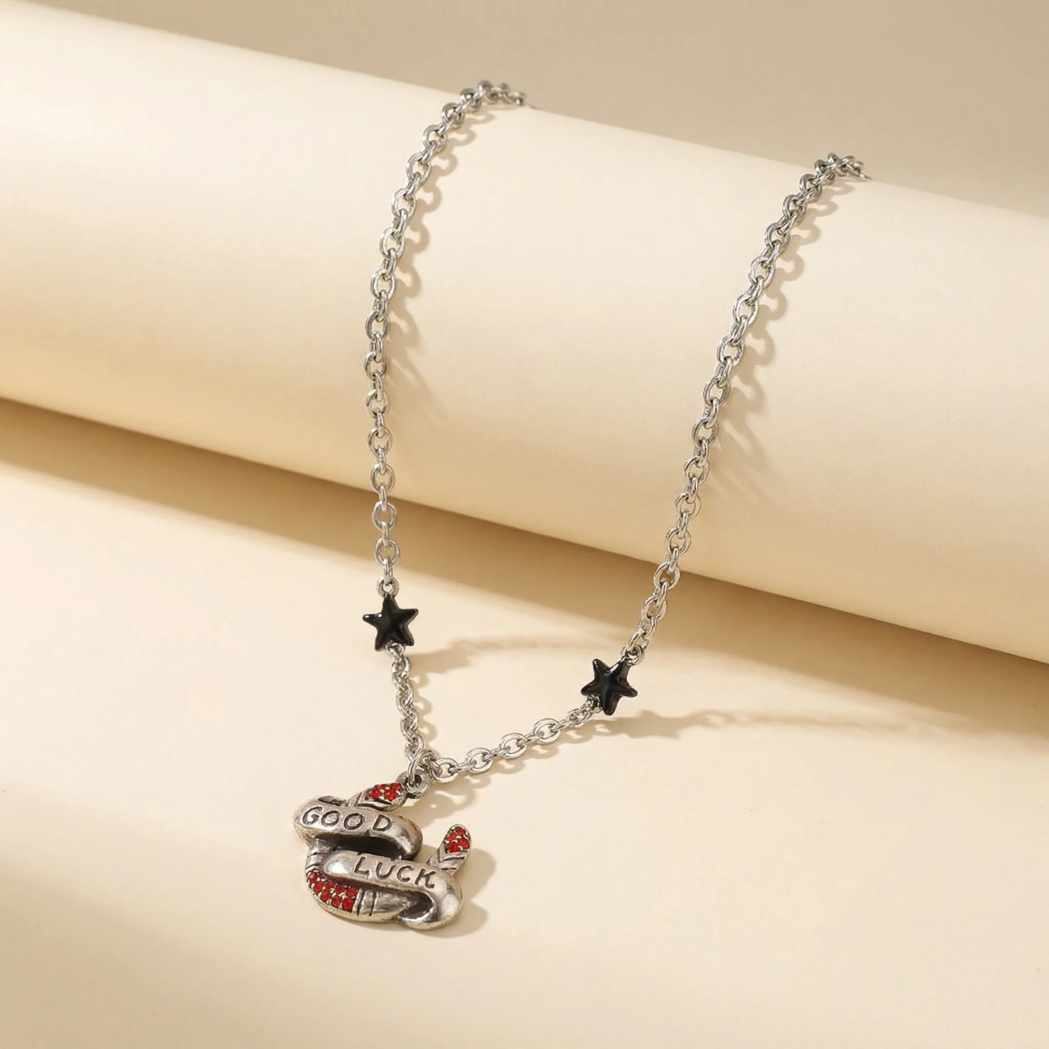 Sourpuss "Good Luck” Horseshoe Necklace with Red Rhinestones & Black Star Charms - Image 4