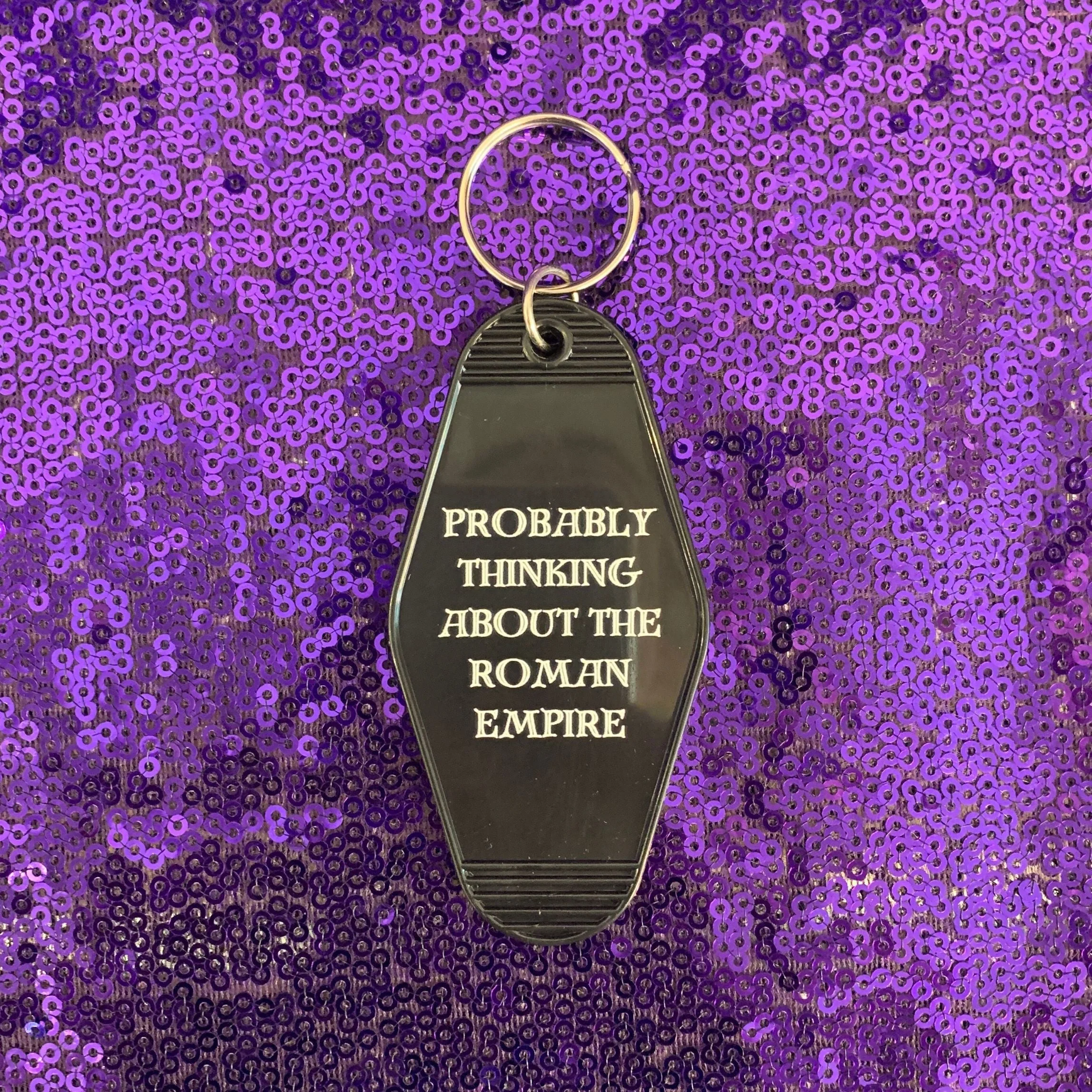 Probably Thinking About the Roman Empire Motel Style Keychain in Black - Image 4