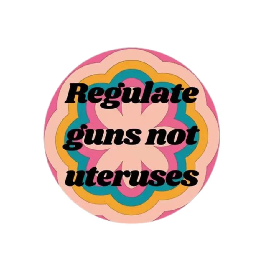 Regulate Guns Not Uteruses 1.25" Button in Groovy Flower Motif - Image 2