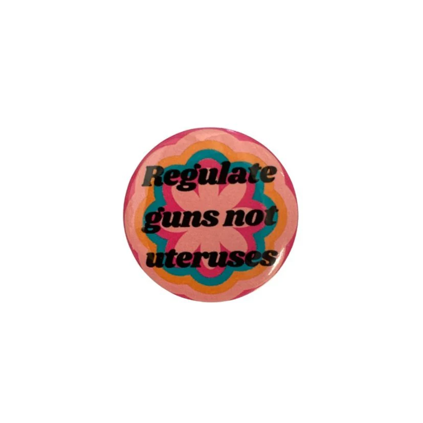 Regulate Guns Not Uteruses 1.25" Button in Groovy Flower Motif - Image 3