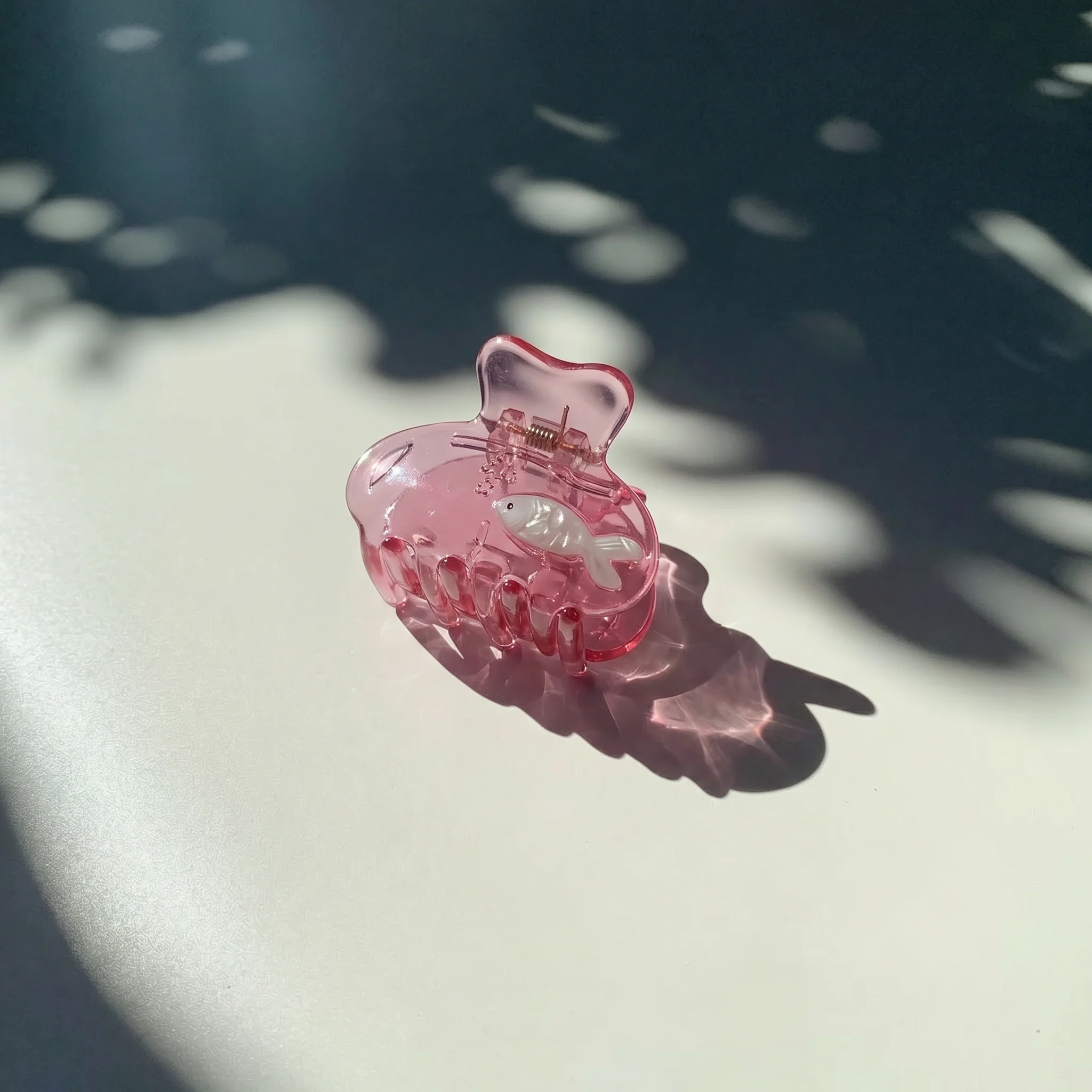 School of One Mini Fish Hair Claw in Translucent Pink