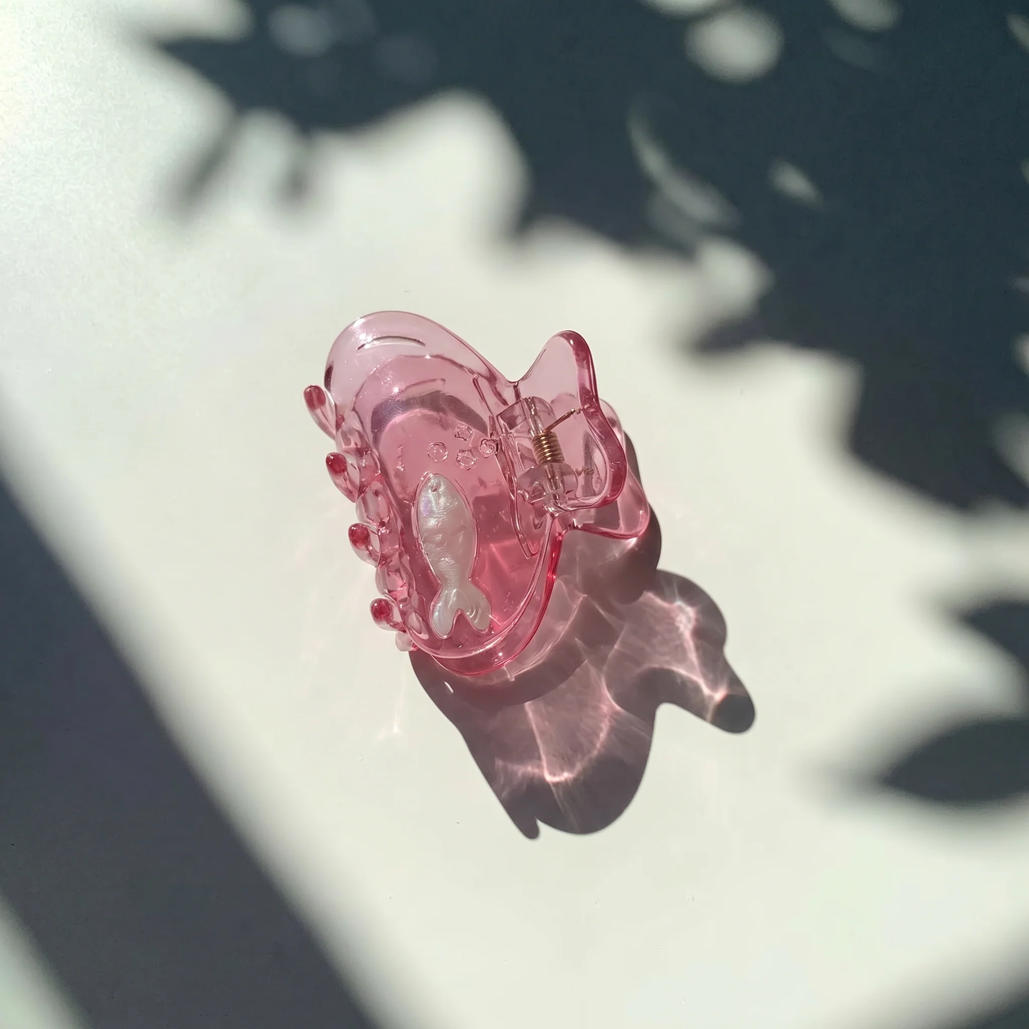 School of One Mini Fish Hair Claw in Translucent Pink - Image 3