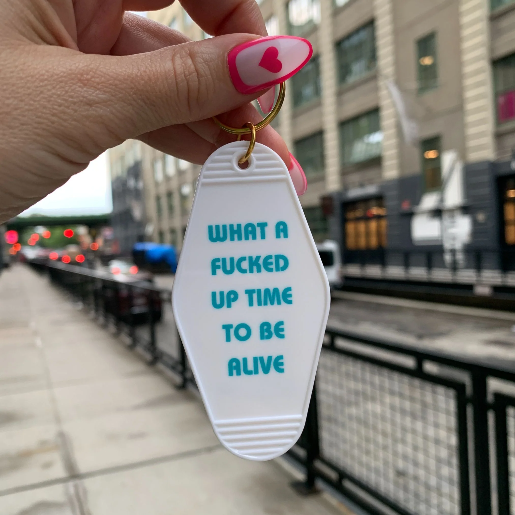 What a Fucked Up Time to Be Alive Motel Style Keychain in White - Image 5