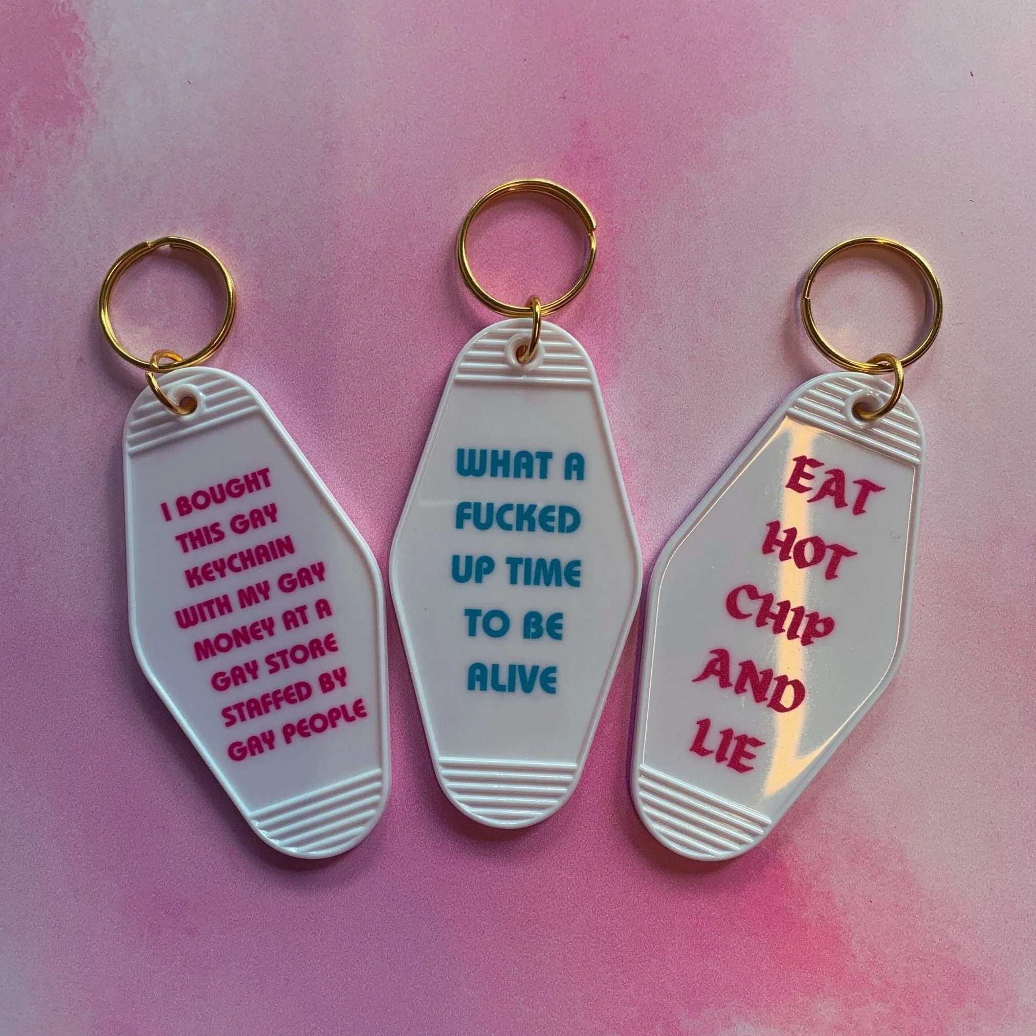 What a Fucked Up Time to Be Alive Motel Style Keychain in White - Image 9